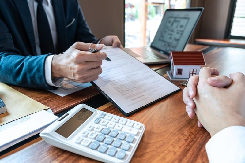 Professional reviewing frequently asked questions about lease abstraction
